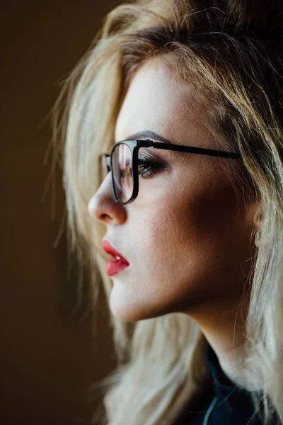 Portrait of a young beautiful girl in glasses with diopters. — Stock Photo, Image