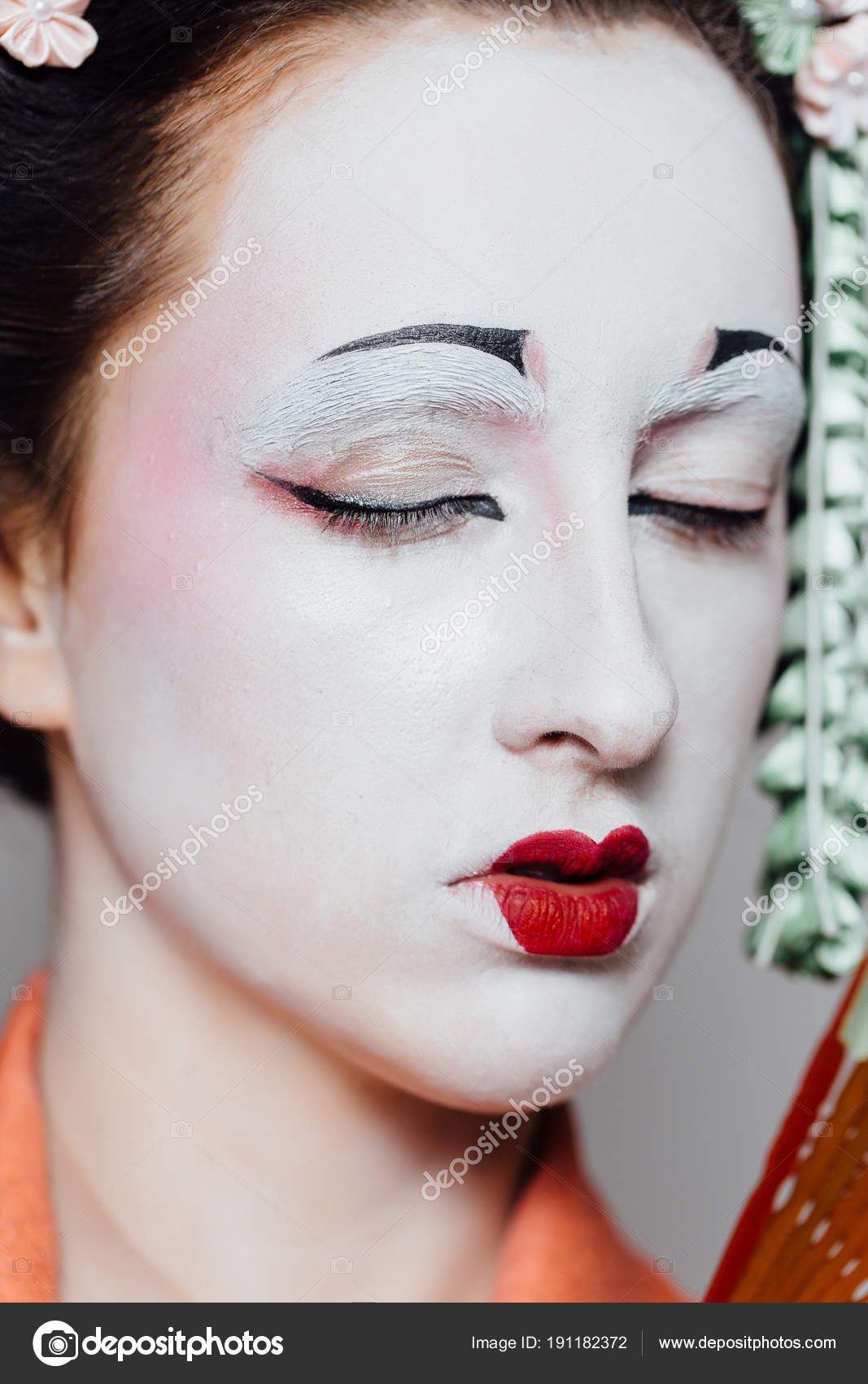 Woman in makeup and a traditional Japanese kimono. Studio, Indoor. Stock Photo by ©photominus 191182372