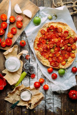 Pizza with tomatoes, shallot and fresh herbs. Cherry Tomato Wood clipart