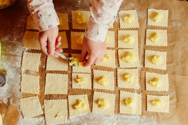 stock image Making of pierogi with potato Vareniki. Russian food . Rustic