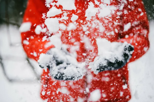 A young woman playing in the snow — Stock Photo, Image