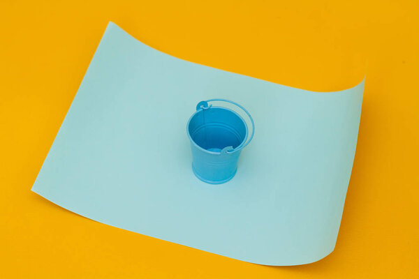 Blue bucket object on  background.