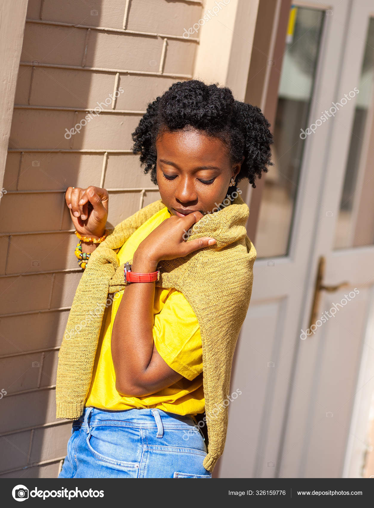 yellow shirt with blue jeans