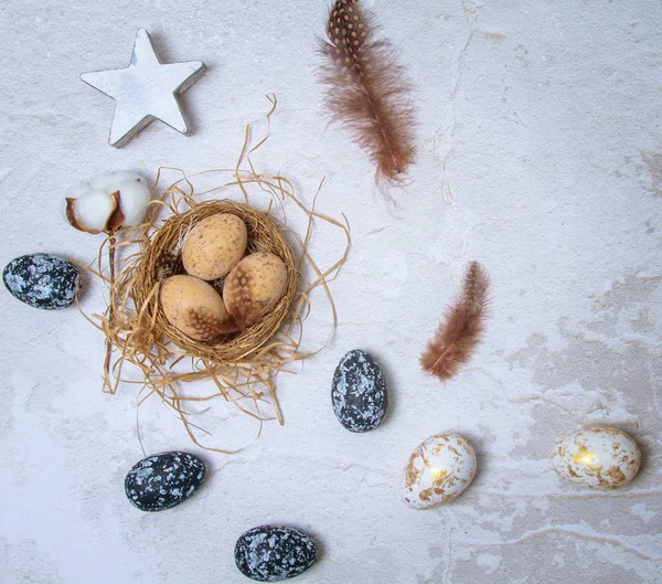 Easter composition religious concept. Chicken eggs in a nest