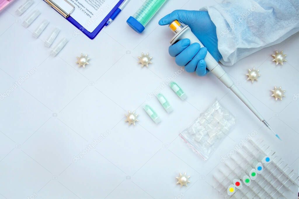 Diagnostic tools for coronavirus. Novel coronavirus SARS-CoV-2, trendy flat lay with copy-space text place. Nucleic acid test, infection, tubes, patient samples.