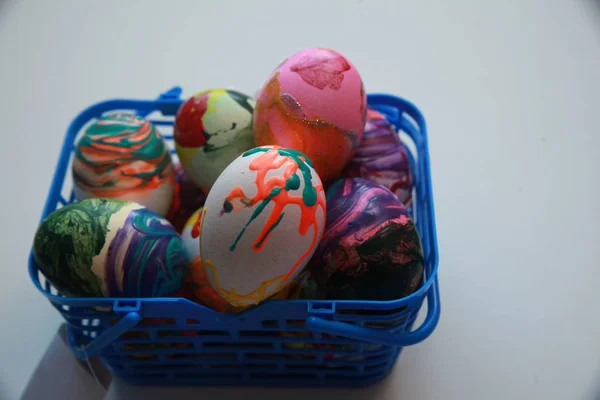 Painted eggs in basket — Stock Photo, Image