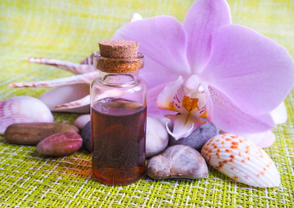 Arabisches Massageöl Steine Und Orchideenblüten Mit Natürlichem Wellnesssalon — Stockfoto