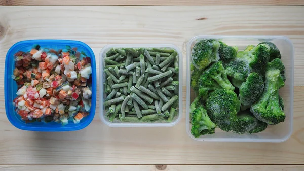 Empty plastic food storage containers. The concept of long-term storage of products.