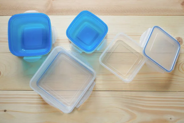 Empty plastic food storage containers. The concept of long-term storage of products.