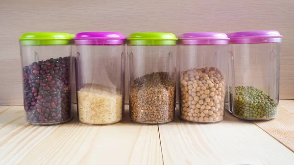 Plastic containers with cereals. Home storage products.