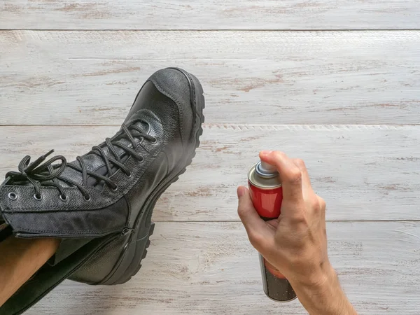 Impregnation of leather boots for winter. — Stock Photo, Image