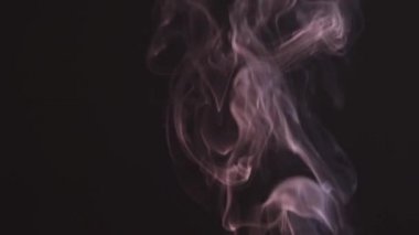 Medical smoke from marijuana. A drug. Isolated white mist on a black background