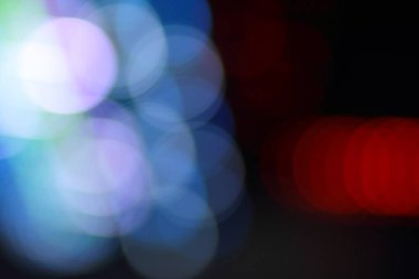 Mavi, kırmızı, sarı, mavi, beyaz bulanık şenlikli bokeh arka plan ile Noel için yıldız