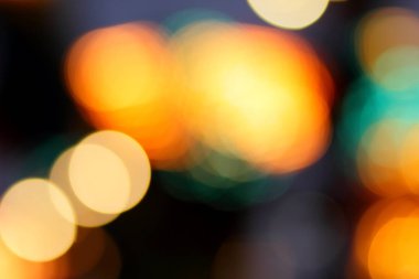 Mavi, kırmızı, sarı, mavi, beyaz bulanık şenlikli bokeh arka plan ile Noel için yıldız