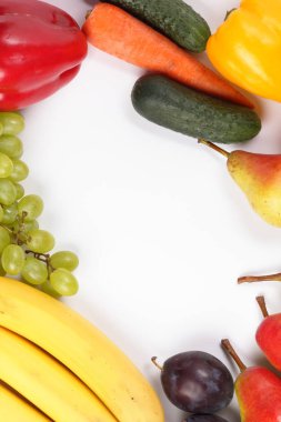 Meyve ve sebzeler üzerinde yazıt Tasarımcısı için bir yer ile beyaz bir arka plan