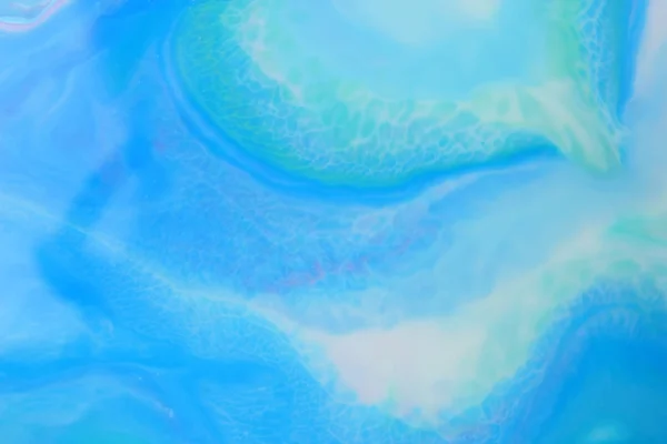 Abstract blue green background with paints on liquid, creative pattern for designer, blue blurred background