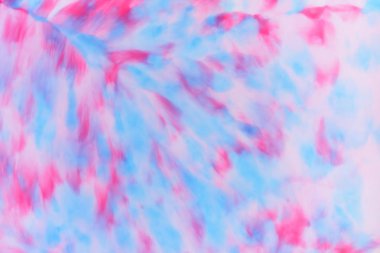 Pembe mavi arka plan bir sıvı, pembe minimalist arka plan üzerinde pop sanat desen, çok renkli bir tasarımcı, arka plan hazırlanması için pastel doku üzerinde süt lekeleri.