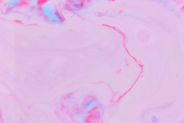 Pembe mavi arka plan bir sıvı, pembe minimalist arka plan üzerinde pop sanat desen, çok renkli bir tasarımcı, arka plan hazırlanması için pastel doku üzerinde süt lekeleri.