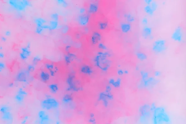 Abstract blue pink paint background on liquid, blue pink holographic stains on milk, holographic cosmic pattern, minimalism, pop art texture for designer, art