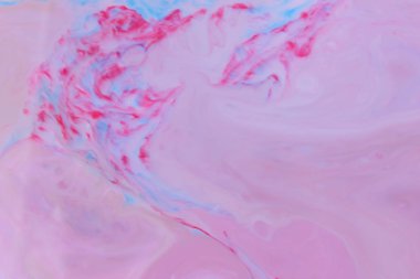 Çok renkli arka plan üzerinde süt, kozmik holografik model, minimalizm, pop art doku tasarımcı için sıvı, çok renkli lekeleri üzerinde boya ile