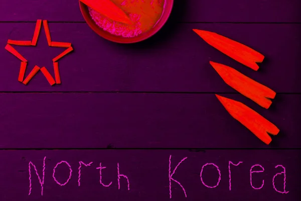 北朝鮮 北朝鮮 核ニンジン 政治的対立 北朝鮮 ミニマリズム コラージュの飢饉との核戦争の概念的なコラージュからの碑文 — ストック写真