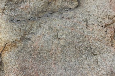 Doğal taş granit doku, granit desen. Taş benekli granit volkanik kaya Mutfak Tezgah vb için kullanılan arka plan. Kahverengi renk tonu ile mermer yüzey