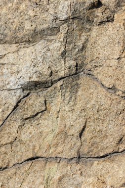 Doğal taş granit doku, granit desen. Taş benekli granit volkanik kaya Mutfak Tezgah vb için kullanılan arka plan. Kahverengi renk tonu ile mermer yüzey