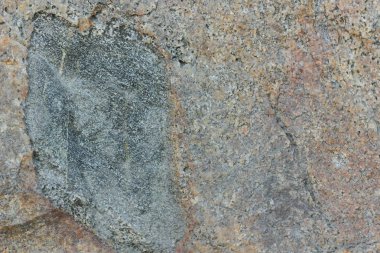 Doğal taş granit doku, granit desen. Taş benekli granit volkanik kaya Mutfak Tezgah vb için kullanılan arka plan. Kahverengi renk tonu ile mermer yüzey