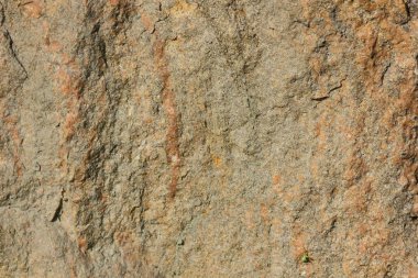 Doğal taş granit doku, granit desen. Taş benekli granit volkanik kaya Mutfak Tezgah vb için kullanılan arka plan. Kahverengi renk tonu ile mermer yüzey