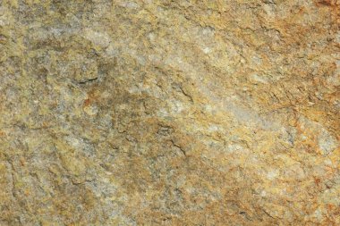 Doğal taş granit doku, granit desen. Taş benekli granit volkanik kaya Mutfak Tezgah vb için kullanılan arka plan. Kahverengi renk tonu ile mermer yüzey. Minimalizm
