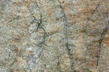 Doğal taş granit doku, granit desen. Taş benekli granit volkanik kaya Mutfak Tezgah vb için kullanılan arka plan. Kahverengi renk tonu ile mermer yüzey. Minimalizm