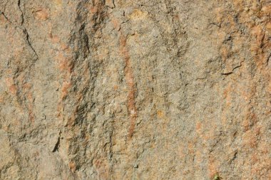 Doğal taş granit doku, granit desen. Taş benekli granit volkanik kaya Mutfak Tezgah vb için kullanılan arka plan. Kahverengi renk tonu ile mermer yüzey. Minimalizm