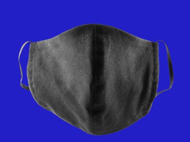 Koruyucu maskeli pop sanatı. Pamuktan yapılmış antivirüs maskesi. Salgın bir virüs olan COVID-19 sırasında siyah stil bir yüz maskesi. Klasik mavi bir grupta yüz koruyucu maskesi