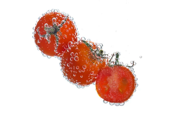 Tomates com bolhas de refrigerante — Fotografia de Stock