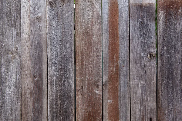 Deel van een oud houten hek — Stockfoto