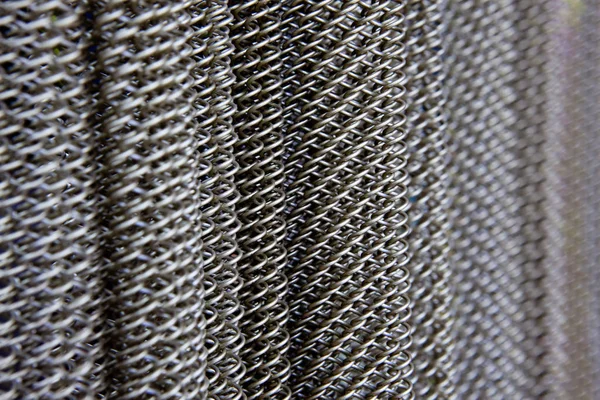 La rete metallica per lo sfondo della cintura industriale — Foto Stock