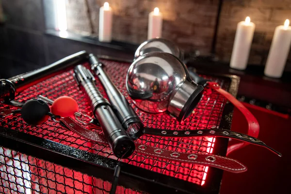 Sexual kink and erotic games concept. Complete sex toy kit set - cuffs, collar and leash for BDSM fantasy play and bondage restraints. — Stock Photo, Image