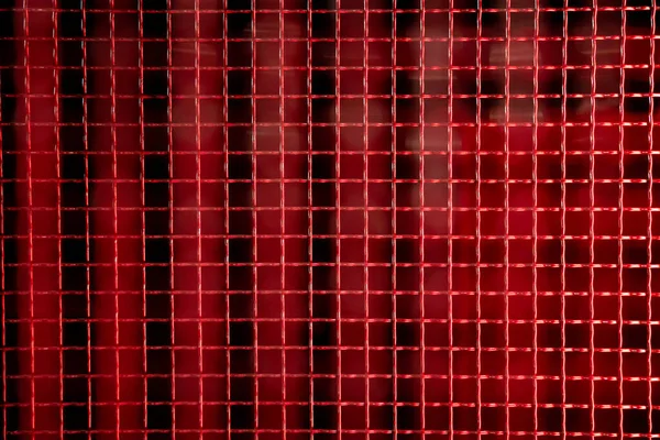 Vermelho colorido fundo malha de metal — Fotografia de Stock