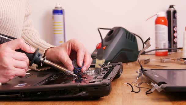 Soldering contacts on laptop computer - 4K — Stock Video