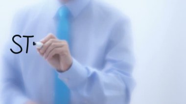 Cama yazılmış borsa. İşadamı işaret kalemiyle sözcükler yazıyor