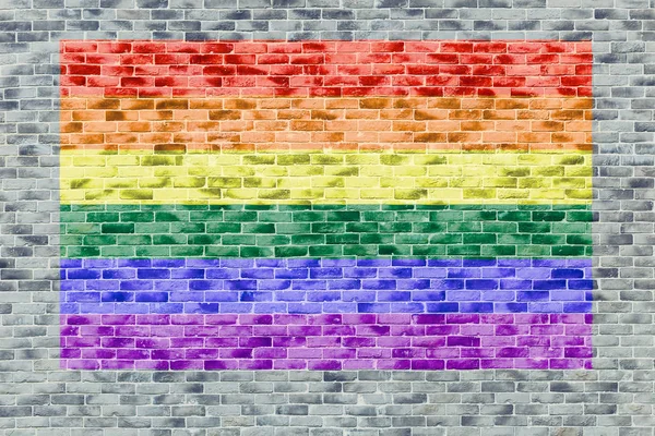 ΛΟΑΤ πολύχρωμο σημαία χρώματος στον τοίχο από τούβλα. — Φωτογραφία Αρχείου