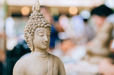 closeup Buda yüzünden el yapımı kil