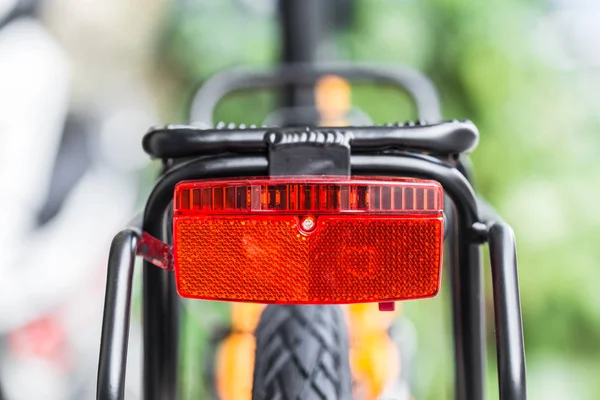 Bicycle back side light reflect red color for safety cycling. — Stock Photo, Image