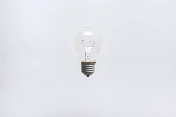 Bulb float in the air, light tungsten bulb clear glass. — Stock Photo, Image