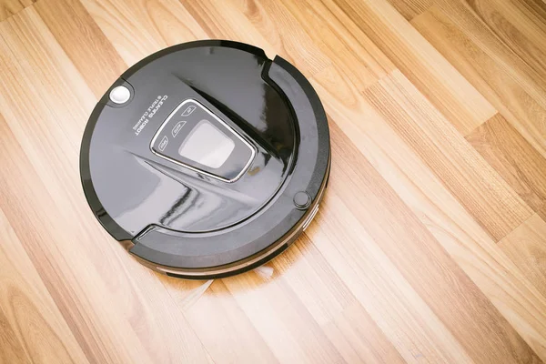 Smart robotic automate wireless cleaning technology machine in living room.