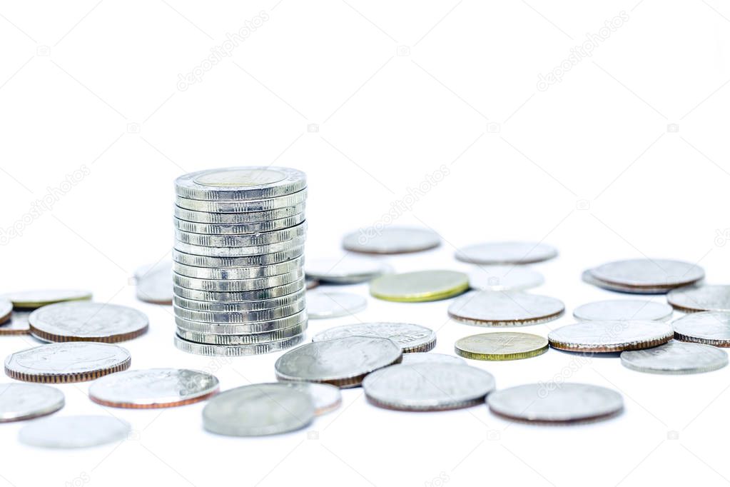 growing money and grow business. silver coin stack isolated on white