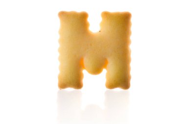 Beyaz yolu ile izole mektup M kurabiye bisküvi İngilizce sermaye yazı tipi.