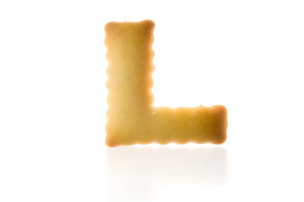 Letter L Cookie Biscuit Engels kapitaal lettertype geïsoleerd op wit met pad. — Stockfoto