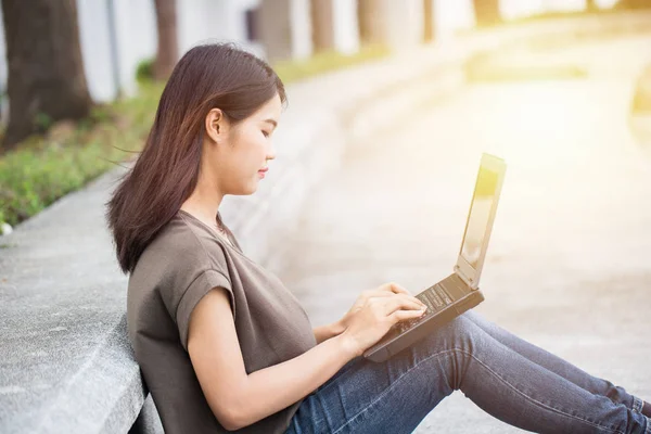 Asian Cute teen women in university using smartphone and laptop modern lifestyle. — Stock Photo, Image