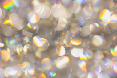 bokeh ışık bulanıklık inci elmas gökkuşağı renkli parlaklık yansıtmak arka plan.